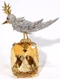 021171 SCHLUMBERGER CITRINE DIAMOND BIRD ON ROCK