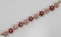 020111 14 KT 2TONE GOLD DIAMOND RUBY BRACELET