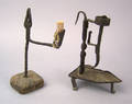 Two wrought iron rush light and candleholders 19th c