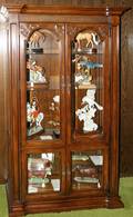050175 CARVED WOOD  BEVELED GLASS CURIO CABINETS
