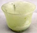 050223 CHINESE CARVED JADE DISH H 1 34 DIA 2 14