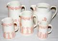 032275 WEDGWOOD EMBOSSED PINK QUEENS WARE PITCHERS