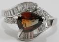 012182 2CT ORANGE SAPPHIRE  15CT DIAMOND RING