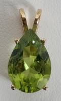 030318 14KT YELLOW GOLD AND 275 CT PERIDOT PENDANT