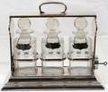 012258 ENGLISH TANTALUS SET W CUT CRYSTAL BOTTLES