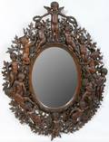 122279 OAK PIERCED CHERUB  LEAF MIRROR 42x32