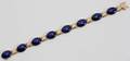 011498 14K YELLOW GOLD  LAPIS BRACELET