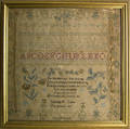Silk on linen sampler dated 1812