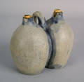 Rare Pennsylvania or New York blue decorated stoneware gemel jug ca 1800