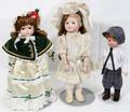 031616 PORCELAIN HEAD DOLLS THREE H 14 16  17