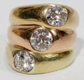 052049 THREE DIAMOND  GOLD RINGS MOUNTED AS ONE