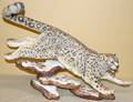 030047 CONNOISSEUR BISQUE FIGURE OF A SNOW LEOPARD