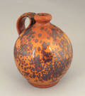 Redware jug 19th c
