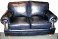 102079 BRADINGTON YOUNG NAVY LEATHER LOVESEAT