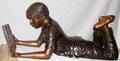 071157 BRONZE GARDEN SCULPTURE A BOY READING A BOOK
