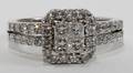 100100 250 CT PRINCESS AND ROUND CUT DIAMOND RING