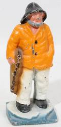 090184 IRON TOY FISHERMAN ANTIQUE W 2 12 H 7