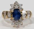 072157 BLUE SAPPHIRE CENTRAL STONE  DIAMOND RING