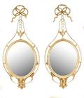 Pair of Neoclassical Style Oval Giltwood Mirrors