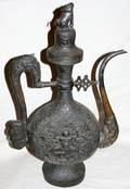 082234 ORIENTAL SPELTER WINE PITCHER RAISED RELIEF