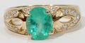 090303 14KT YELLOW GOLD DIAMOND AND EMERALD RING