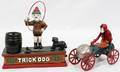 082256 TRICK DOG MECHANICAL BANK ARMED WHEELED RACER