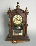 Connecticut rosewood mantle clock by Welch