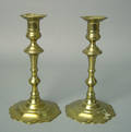 Pair of Queen Anne brass push up candlesticks mid 18th c