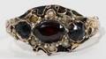 071458 9KT YELLOW GOLD  GARNET RING