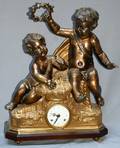 092440 ROCOCO STYLE GILT METAL FIGURAL MANTEL CLOCK