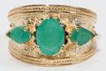 100392 14 KT YELLOW GOLD AND EMERALD RING