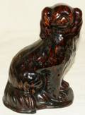 072478 ENGLISH POTTERY FIGURE OF SEATED DOG H 9 12