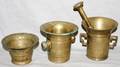 091611 BRASS MORTARS THREE  A PESTLE