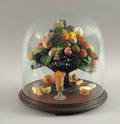 Basket of wax fruit with glass dome ca 1900