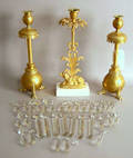 Three brass candlesticks with prisms