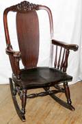 010235 RJ HORNER WALNUT CARVED ROCKING CHAIR