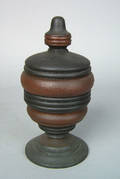 Pennsylvania elaborately turned poplar covered canister 19th c