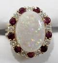 112286 105CT AUS OPAL RING W DIAMONDS  RUBIES