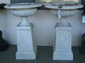 Pair of cast iron garden urns