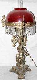 012423 VICTORIAN SPELTER OIL LAMP W RUBY GLASS SHADE