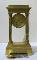 French gilt portico clock