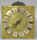 Brass face hook and spike clock