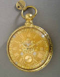 English 18K gold key wind fusee pocket watch with mixed metal face