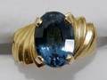 111618 YELLOW GOLD  BLUE TOPAZ RING