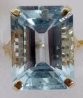 091272 EMERALD CUT BLUE TOPAZ  14K YELLOW GOLD RING