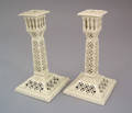 Pair of Leeds reticulated candlesticks early 20th c