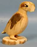 063655 ANTOGHAME CARVED IVORY FIGURE OF A PUFFIN