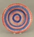 Red and blue rainbow spatter bullseye shallow bowl 19th c