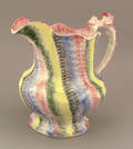 Five color rainbow spatter pitcher 19th c