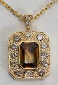 061045 22CT COGNAC SAPPHIRE  12CT DIAMOND PENDANT
